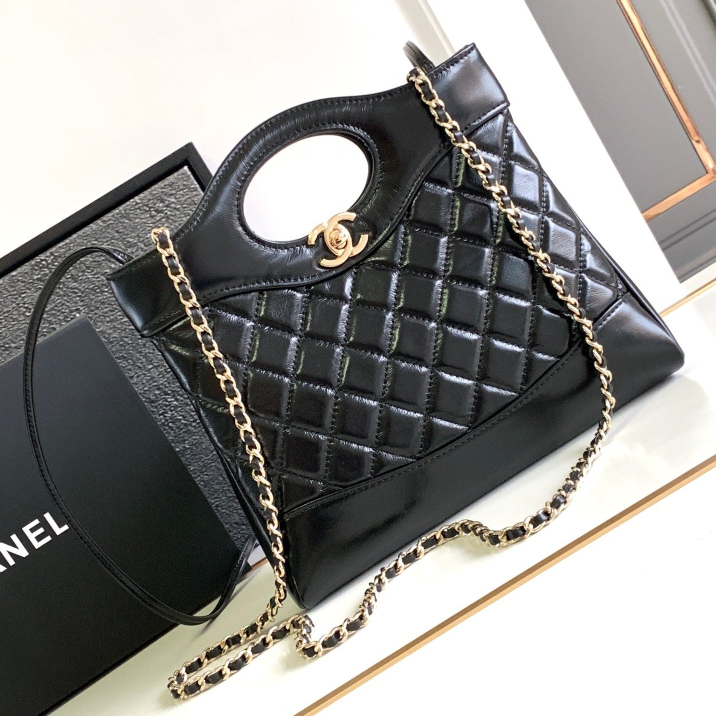CHANEL 24s31 mini shopping bag 22cm black lambskin gold hardware