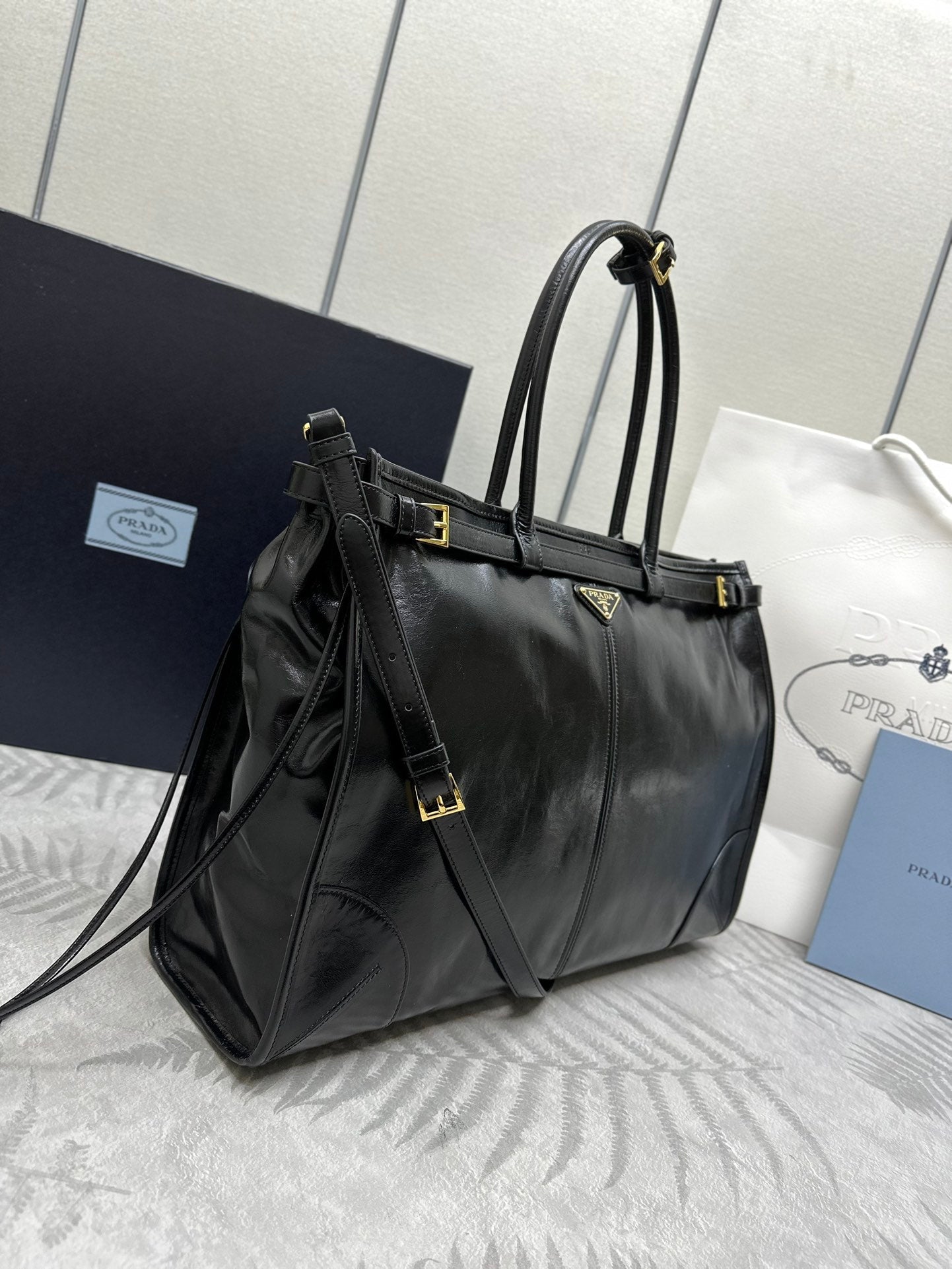 PRADA TOTE BAG WITH BELT 42 IN BLACK OIL WAX LAMBSKIN GOLD HARDWARE