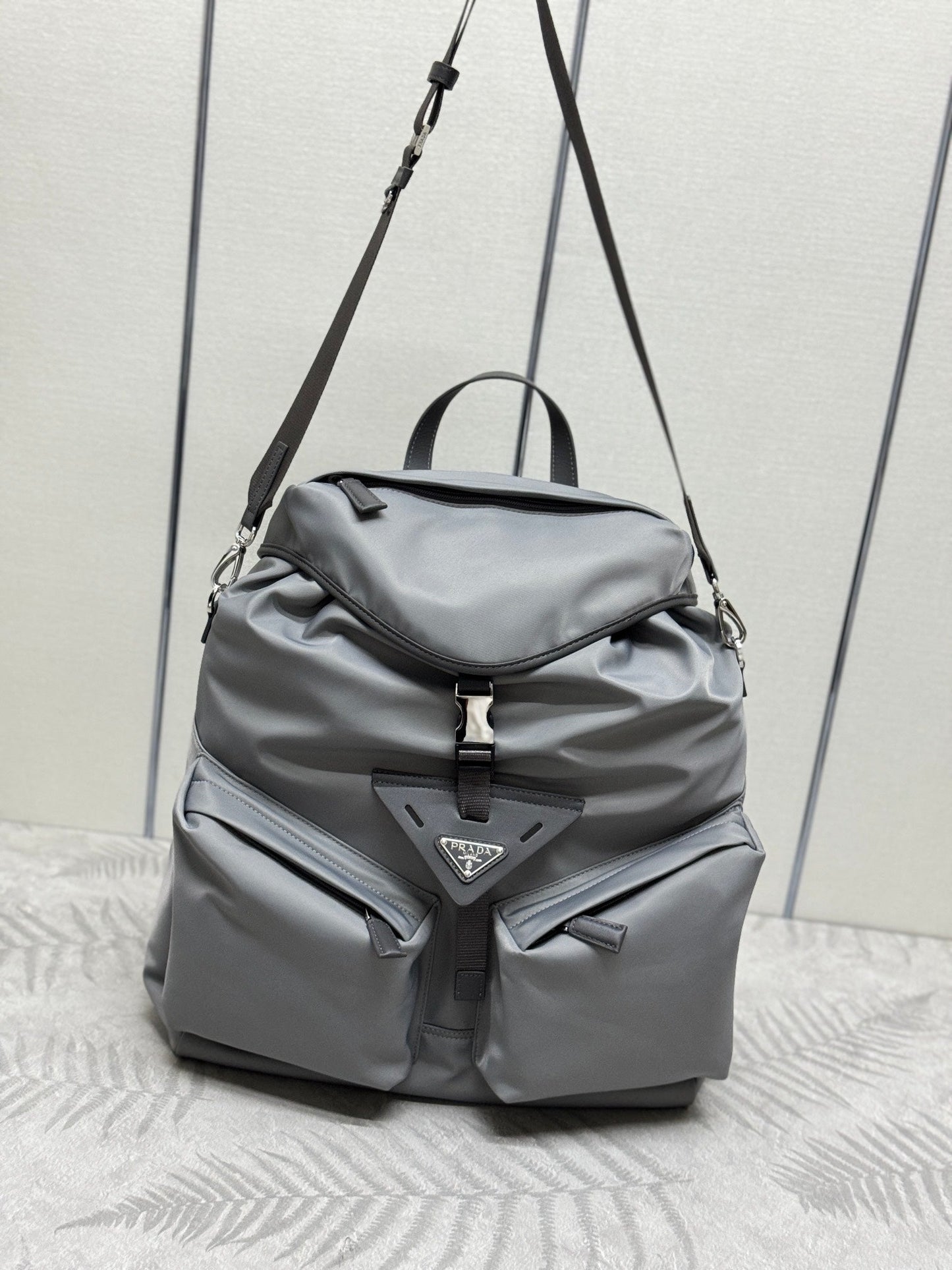 PRADA TRIANGLE LOGO BACKPACK 42 IN RHINO GRAY RE-NYLON