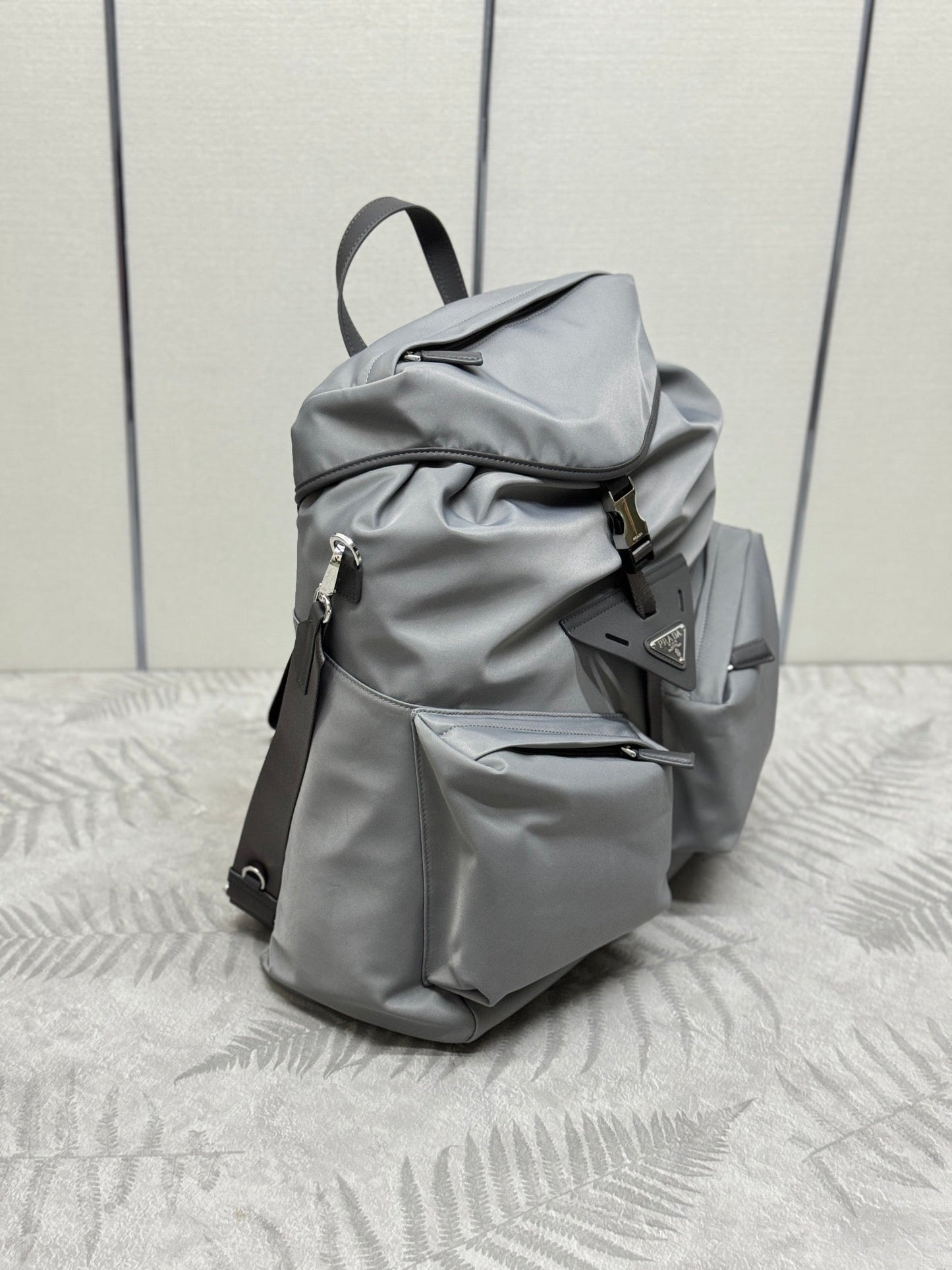PRADA TRIANGLE LOGO BACKPACK 42 IN RHINO GRAY RE-NYLON
