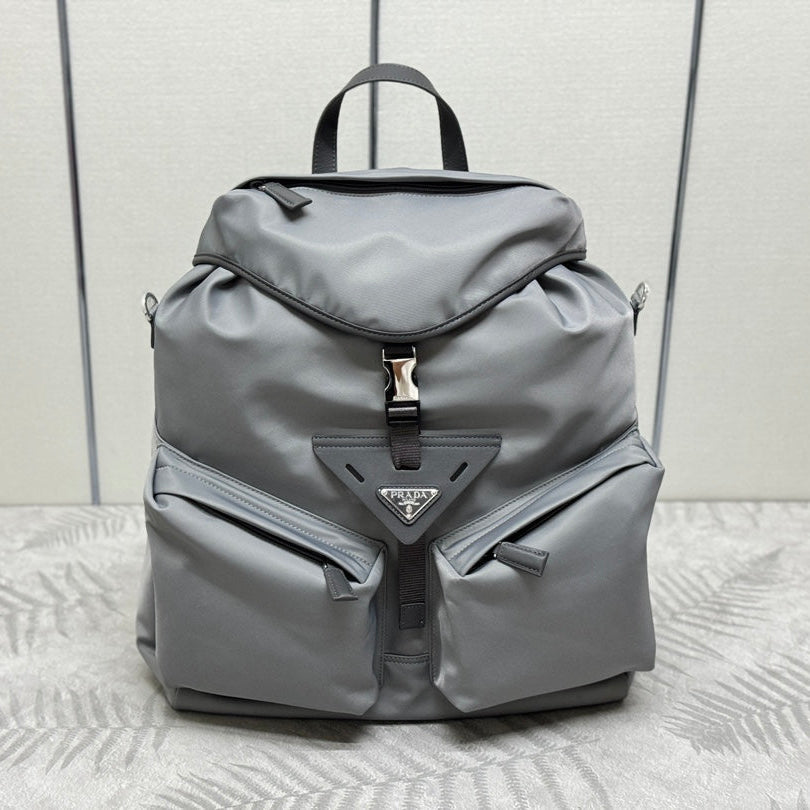 PRADA TRIANGLE LOGO BACKPACK 42 IN RHINO GRAY RE-NYLON