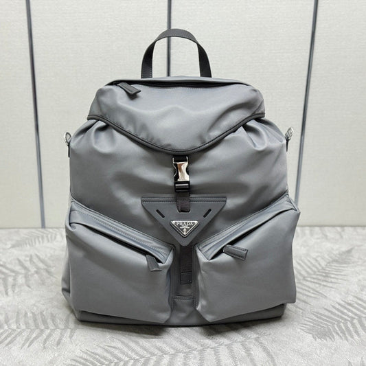 PRADA TRIANGLE LOGO BACKPACK 42 IN RHINO GRAY RE-NYLON