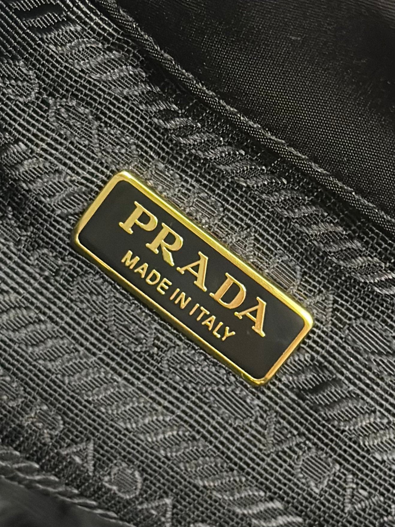 PRADA BUCKET BAG 19 IN BLACK RE-NYLON AND CALFSKIN HANDLE
