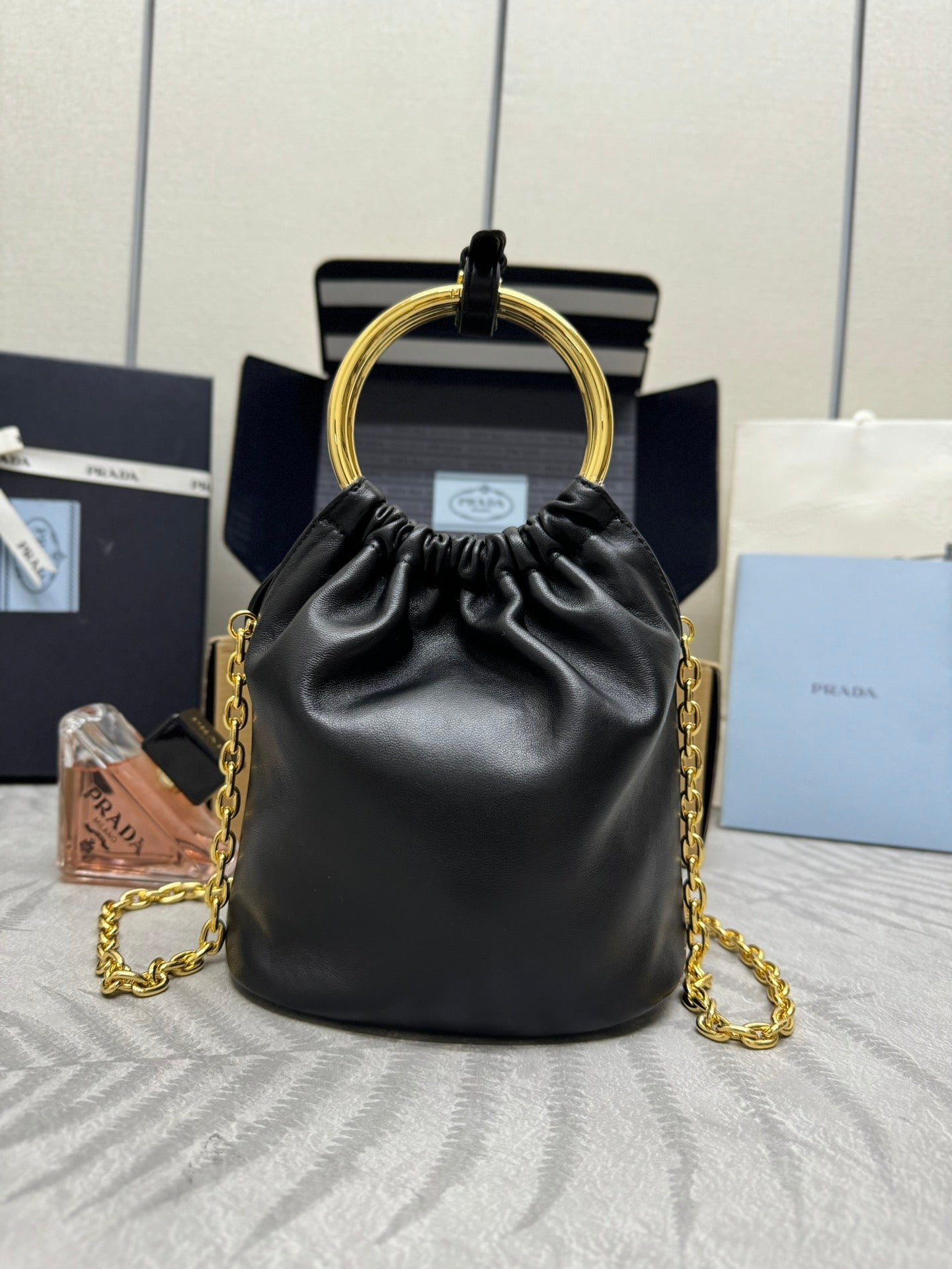 PRADA MINI BUCKET BAG 19 IN BLACK SOFT NAPPA LAMBSKIN GOLD HARDWARE