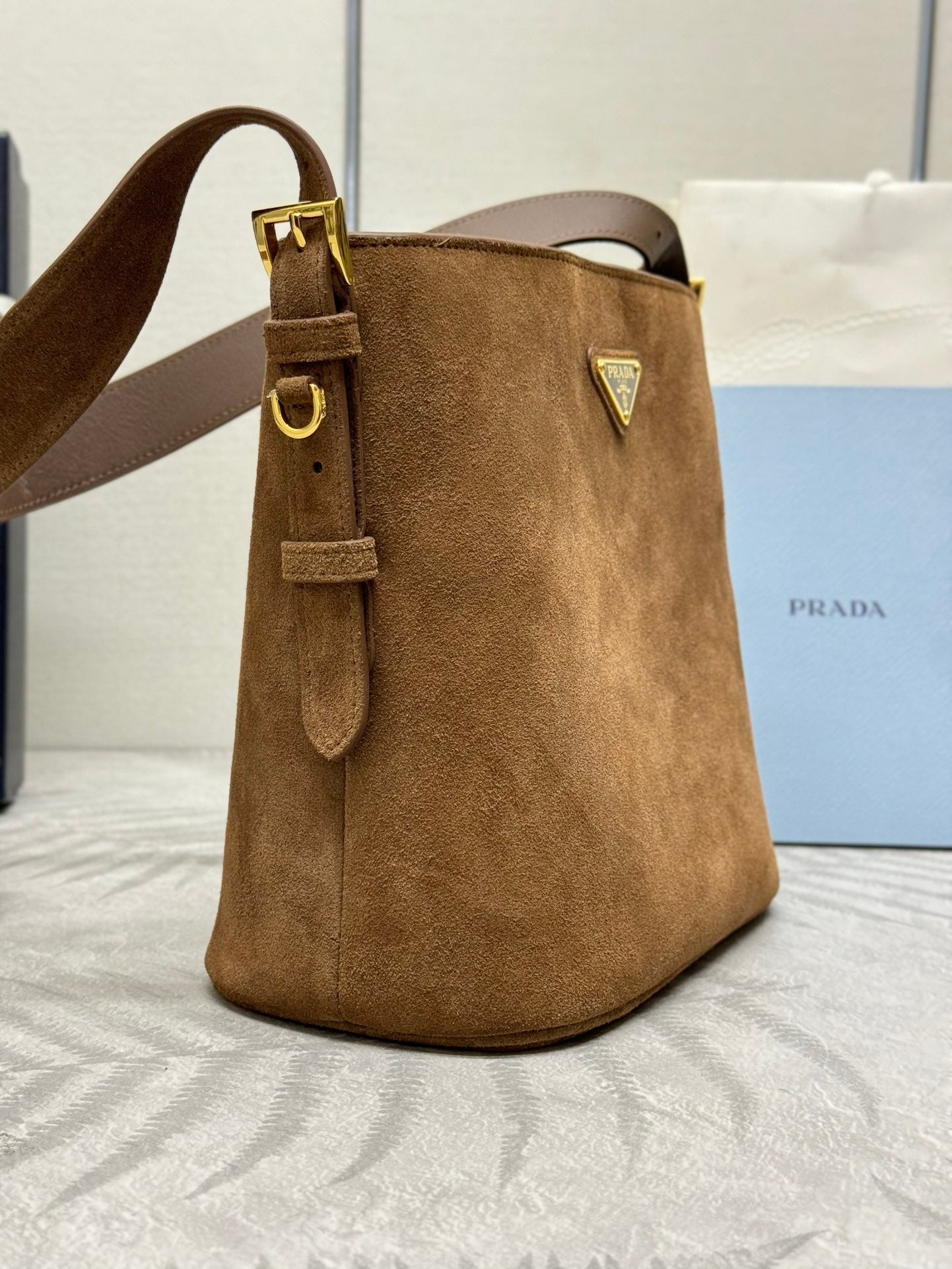 PRADA BUCKET BAG 22 IN RUSSET BROWN SOFT SUEDE