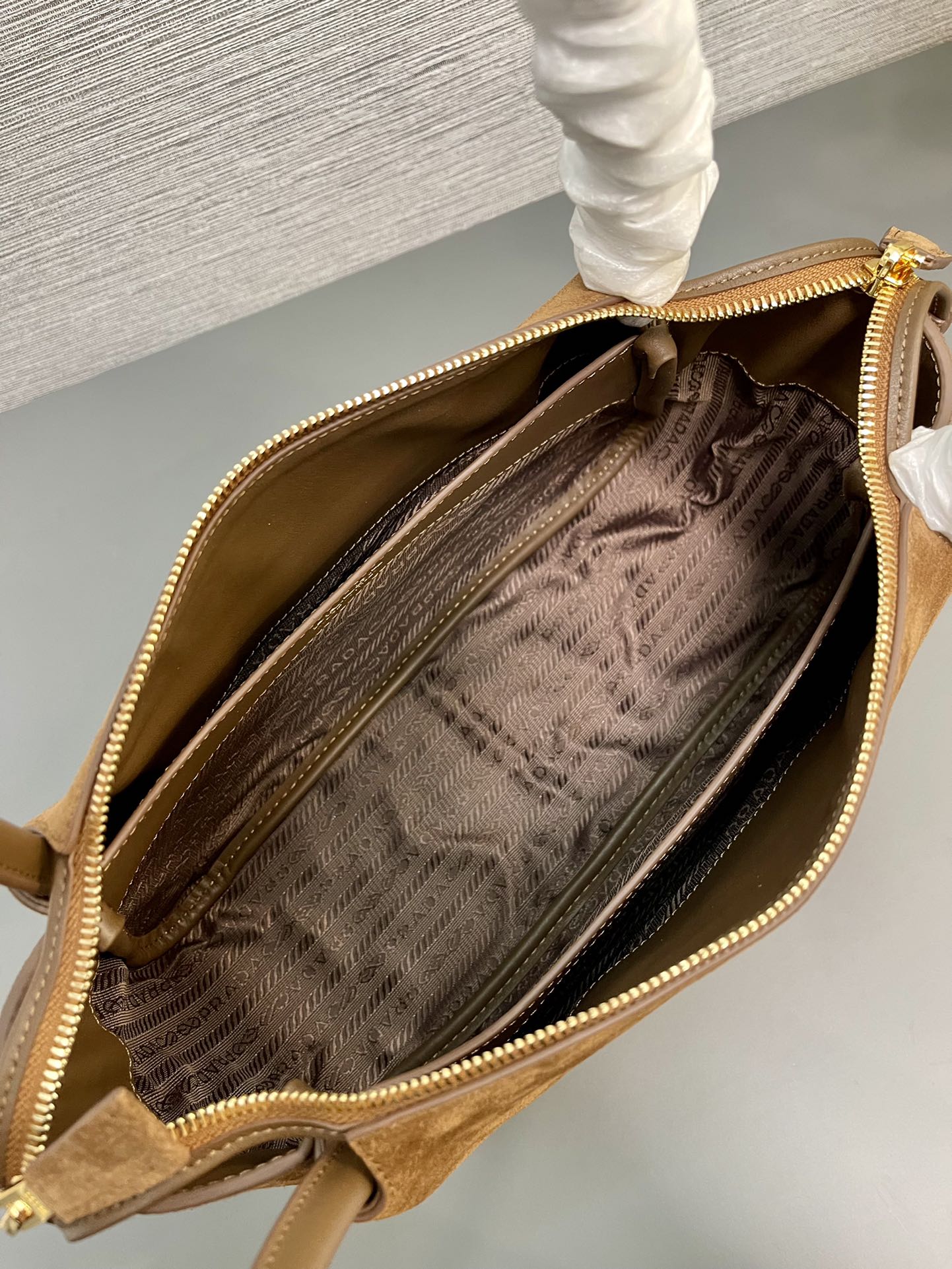 PRADA SHOULDER BAG 28 IN TAWNY BROWN SUEDE GOLD LOGO