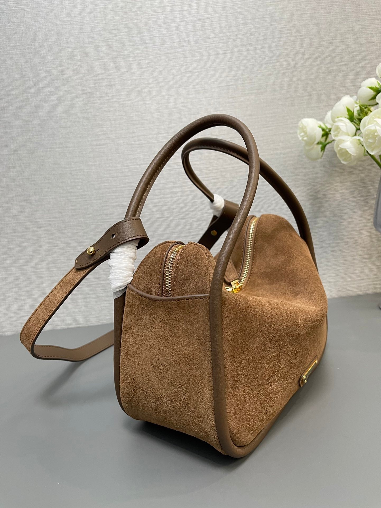 PRADA BOWLING BAG 25 IN ASH BROWN SUEDE AND CALFSKIN TRIM GOLD LOGO