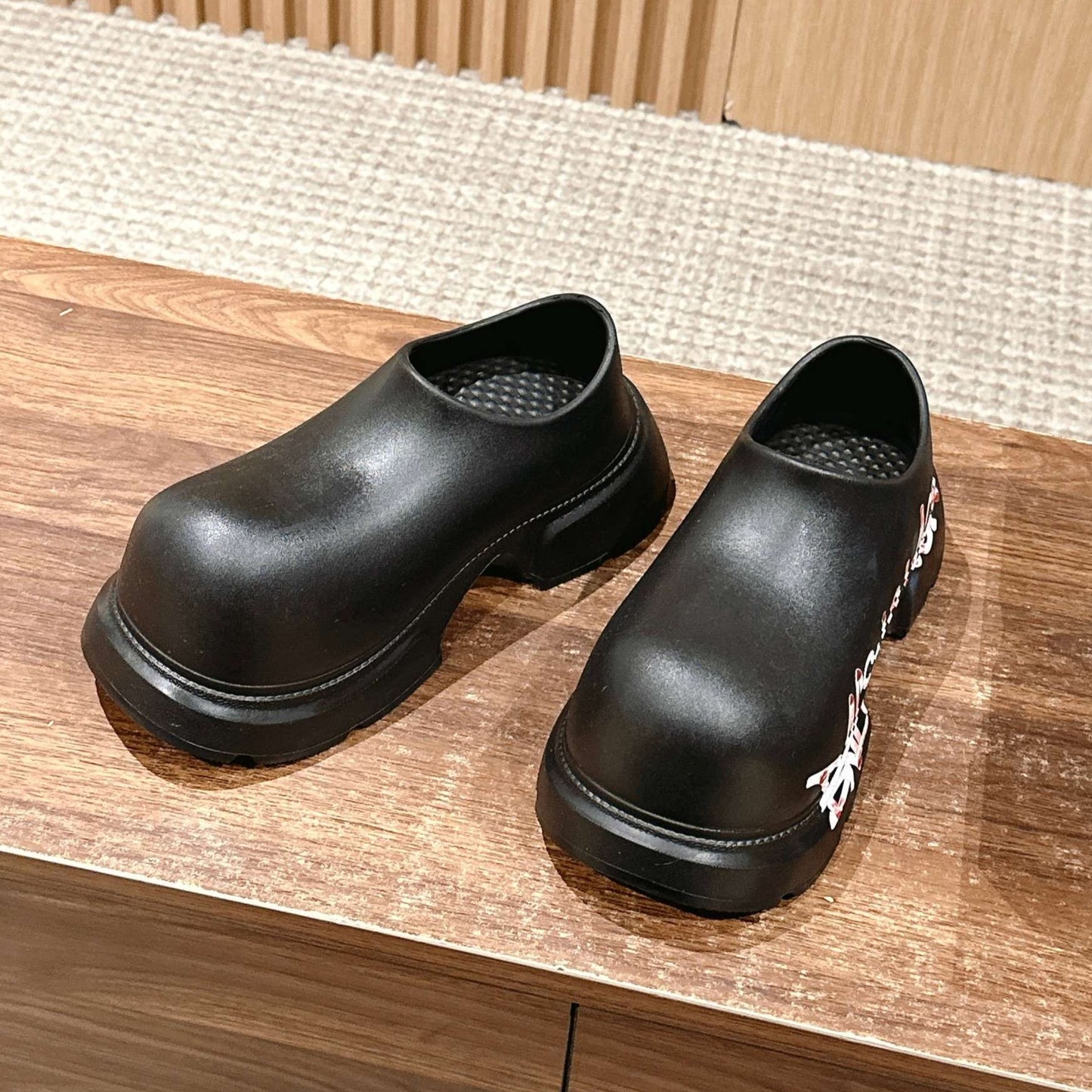 Balanciaga GRAFFITI THICK-SOLED CHEF SHOES IN BLACK RUBBER