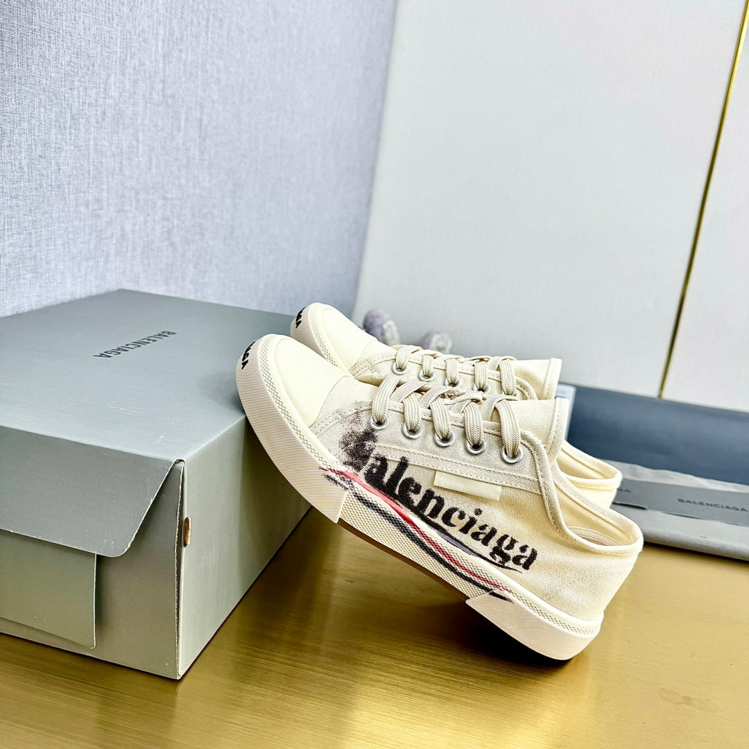 Balanciaga SNEAKERS IN WHITE CANVAS GRAFFITI LOGO