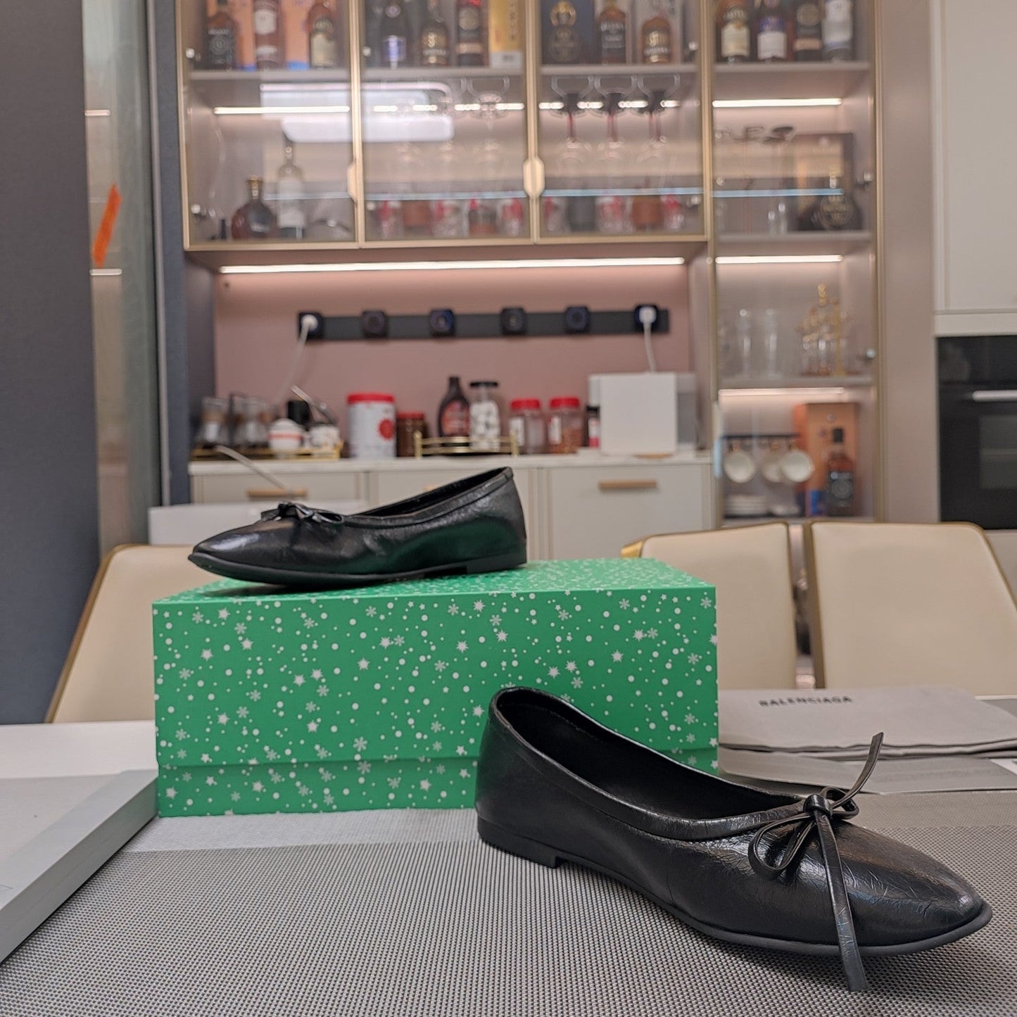 Balanciaga RHINESTONE BALLET FLATS WITH BOW IN BLACK WAX-OIL SHEEPSKIN