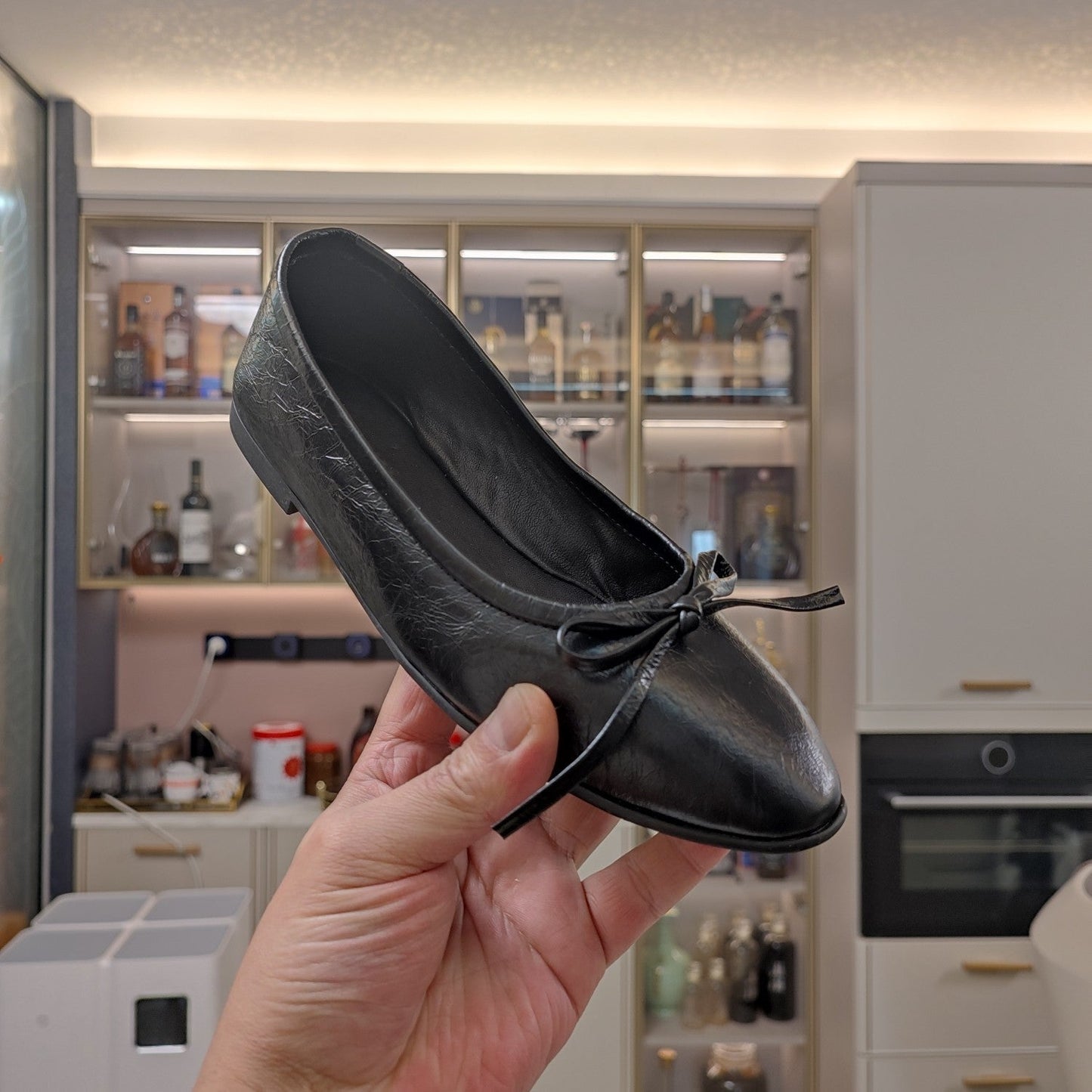 Balanciaga RHINESTONE BALLET FLATS WITH BOW IN BLACK WAX-OIL SHEEPSKIN