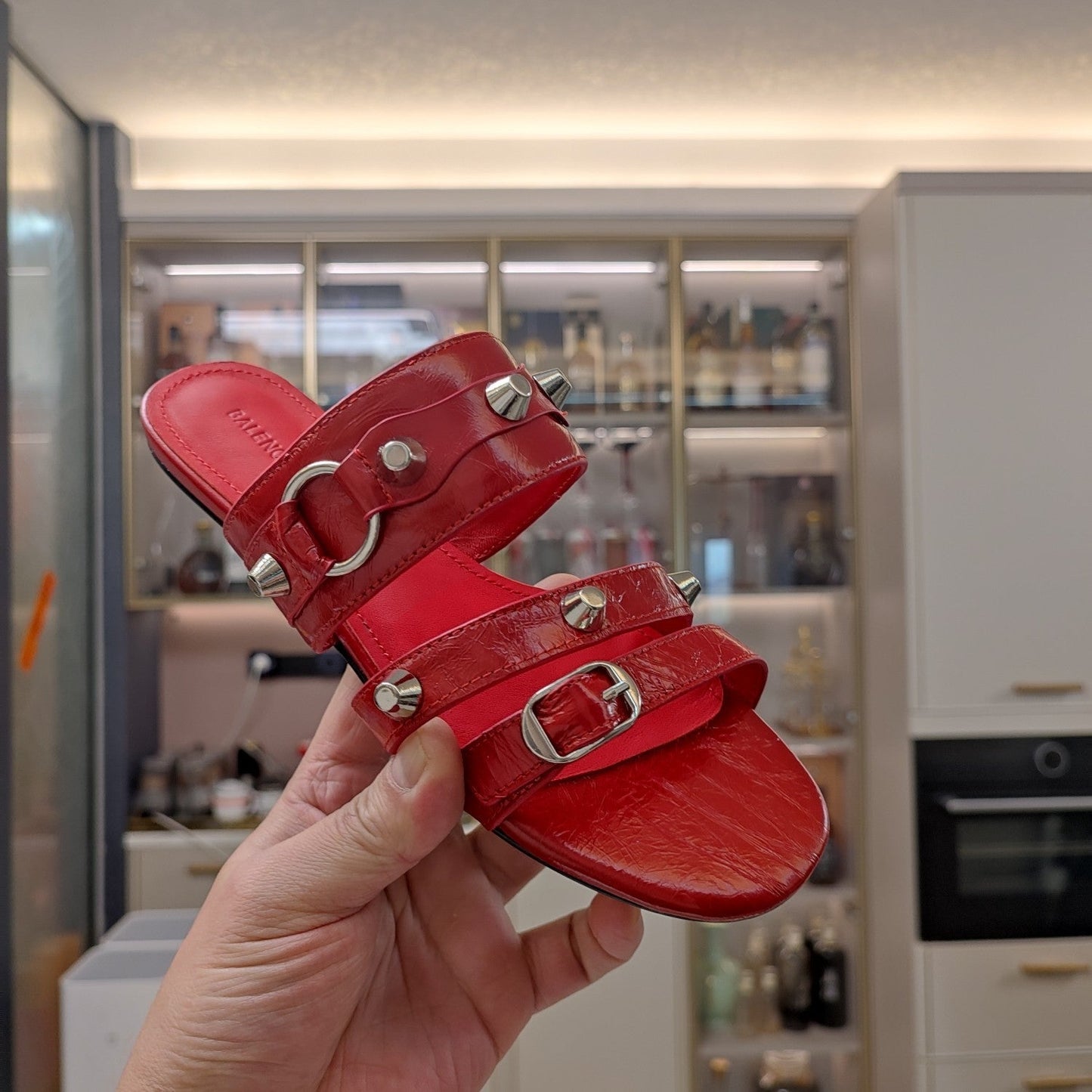 Balanciaga STRAPPY FLAT SANDALS IN RED STUDDED WAX-OIL SHEEPSKIN