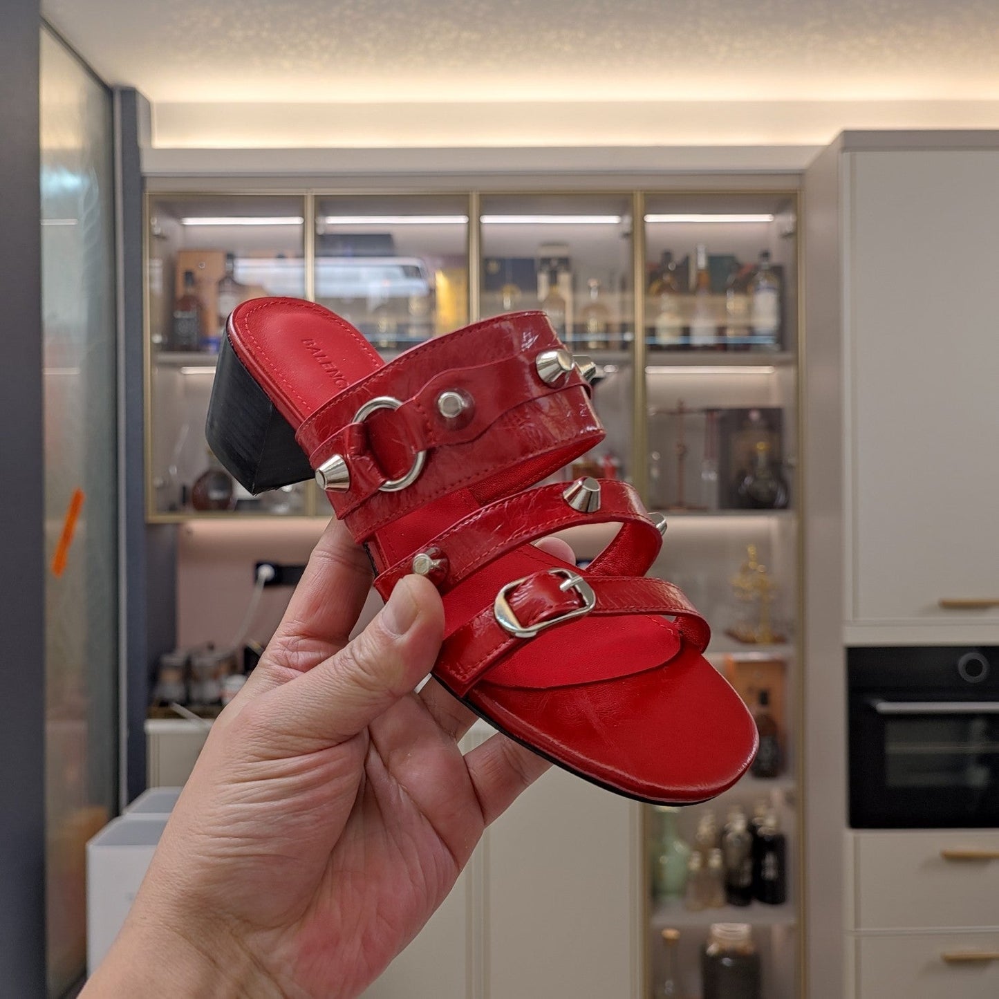Balanciaga STRAPPY MEDIUM HEELED SANDALS IN RED STUDDED WAX-OIL SHEEPSKIN