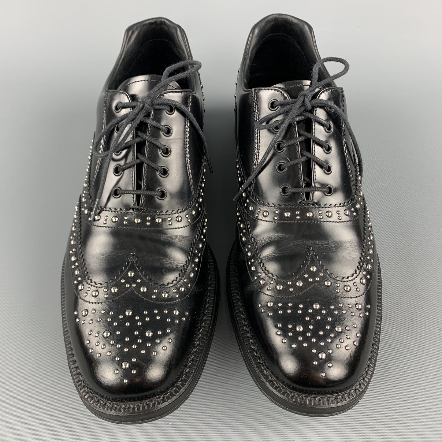 PRADA Size 9.5 Black Studded Leather Wingtip Lace Up Oxfords