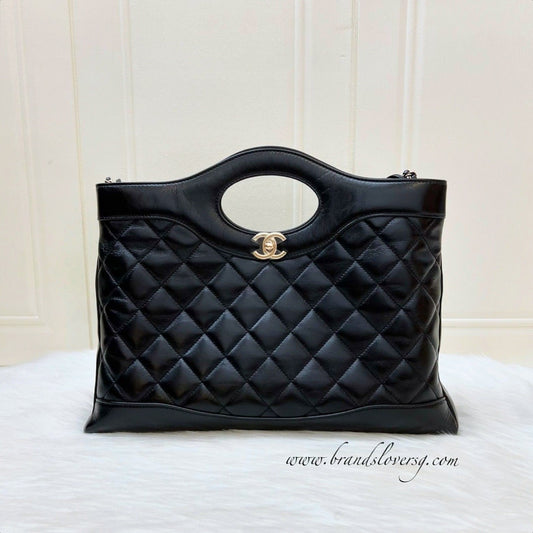 Chanel 31 Medium Shopping Bag in Black Shiny Calfskin and LGHW (Model: AS4854)