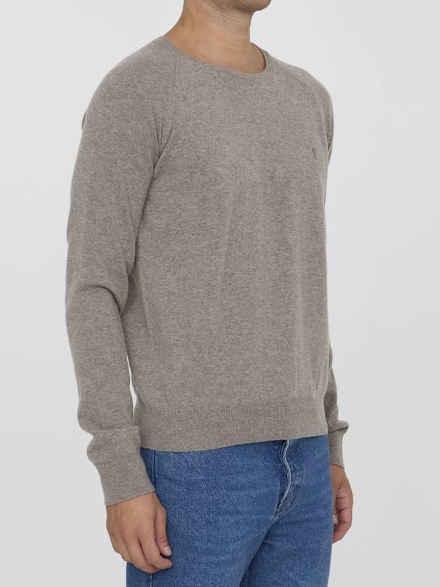 Saint Laurent Cassandre crew neck long sleeve knit top beige