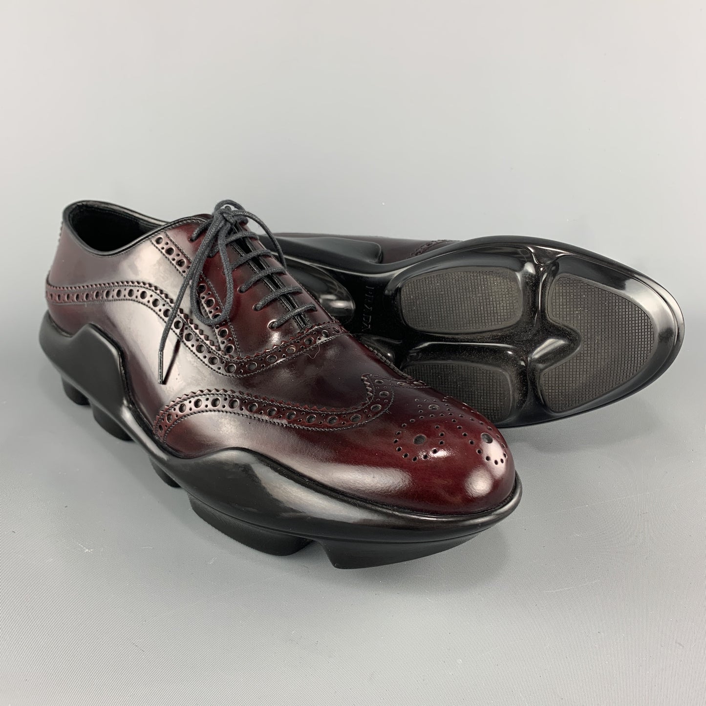 PRADA Size 10 Burgundy Leather Wingtip Rubber Platform Sole Lace Up