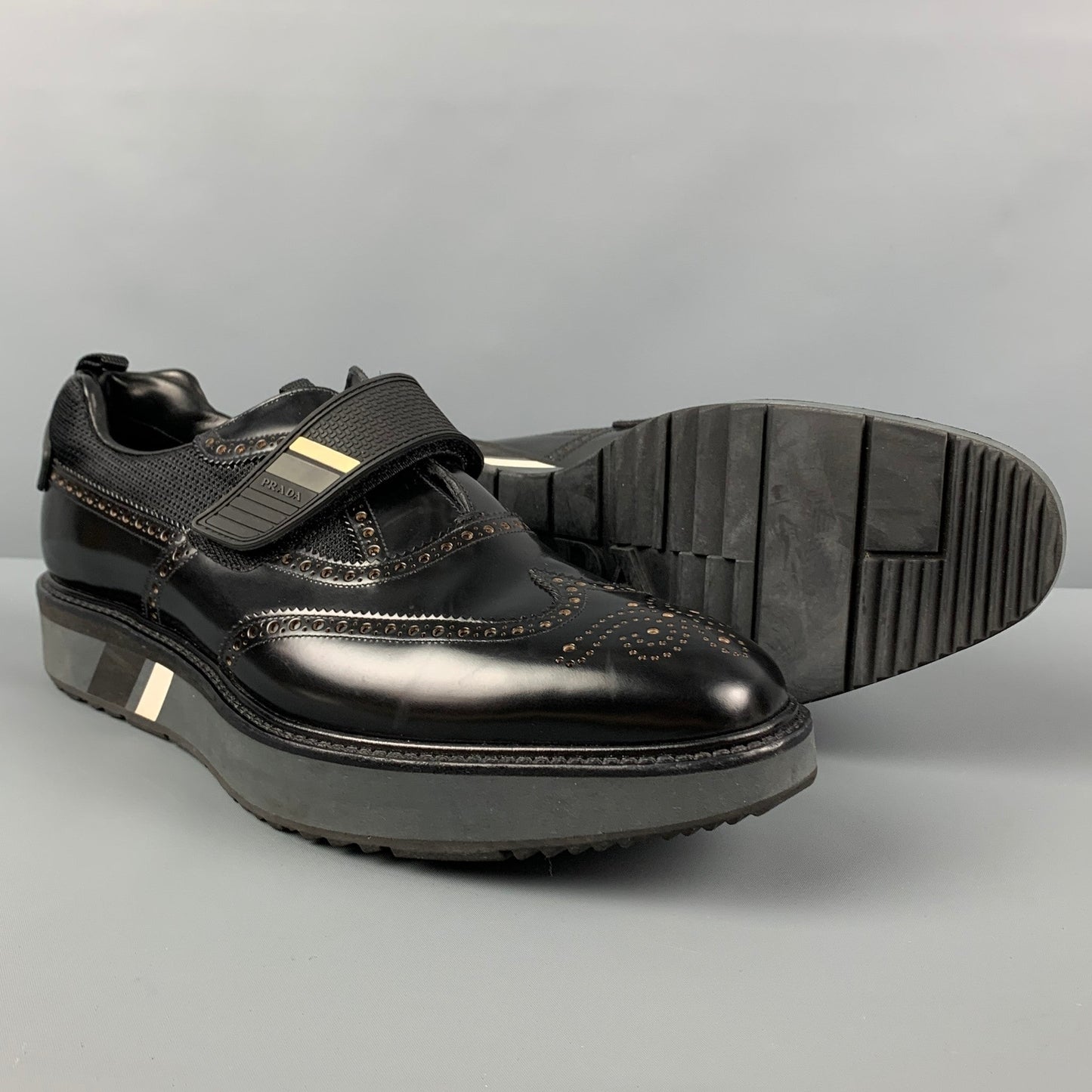 PRADA Size 11 Black Perforated Leather Wingtip Loafers
