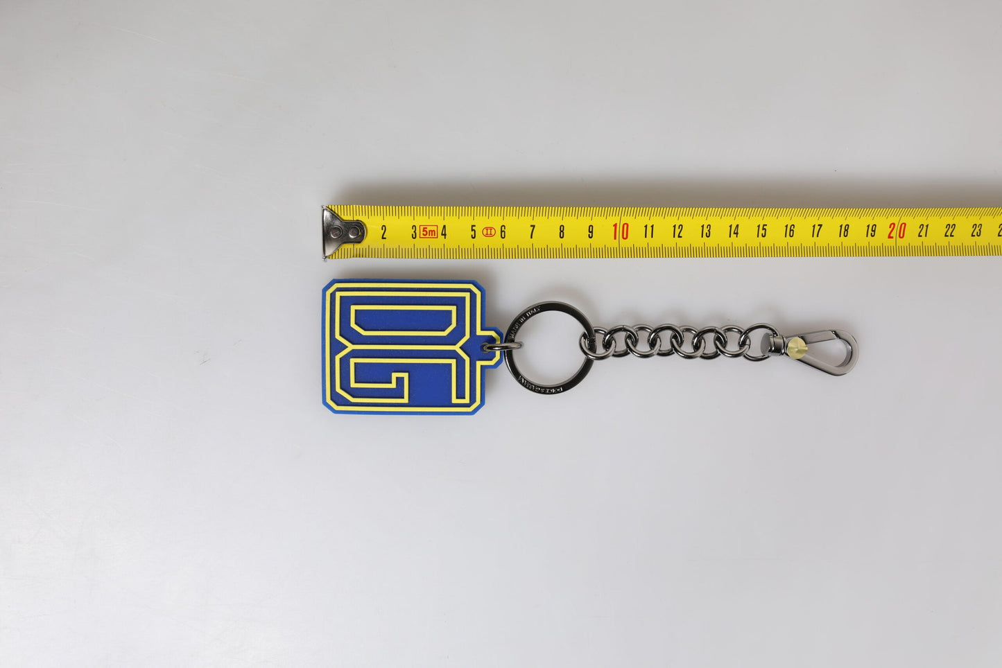Dolce & Gabbana Blue Yellow DG Rubber Logo Silver Men's Keychain Men's Keyring