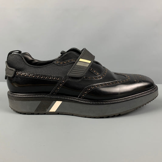 PRADA Size 11 Black Perforated Leather Wingtip Loafers