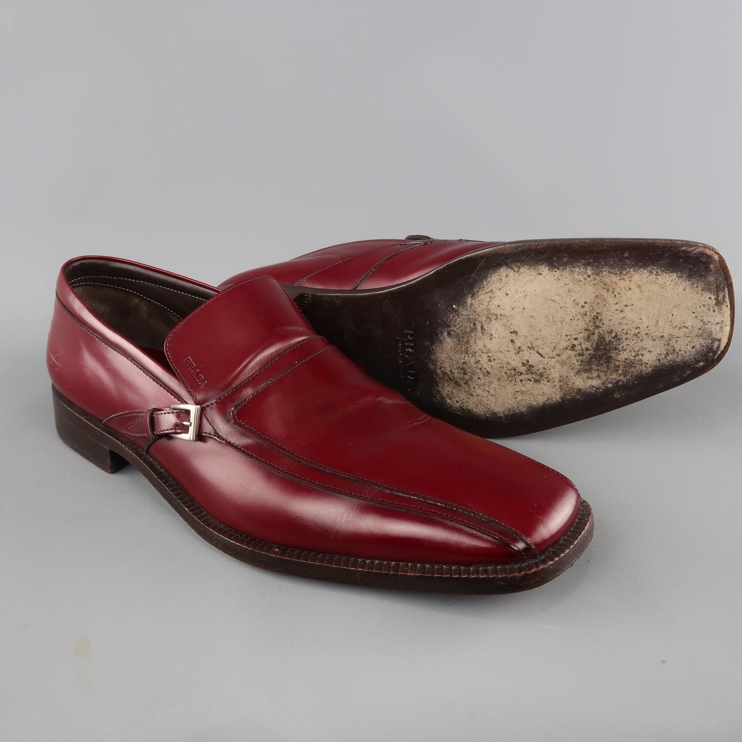 PRADA Size 11 Burgundy Solid Leather Square Toe Buckle Slip On Loafers
