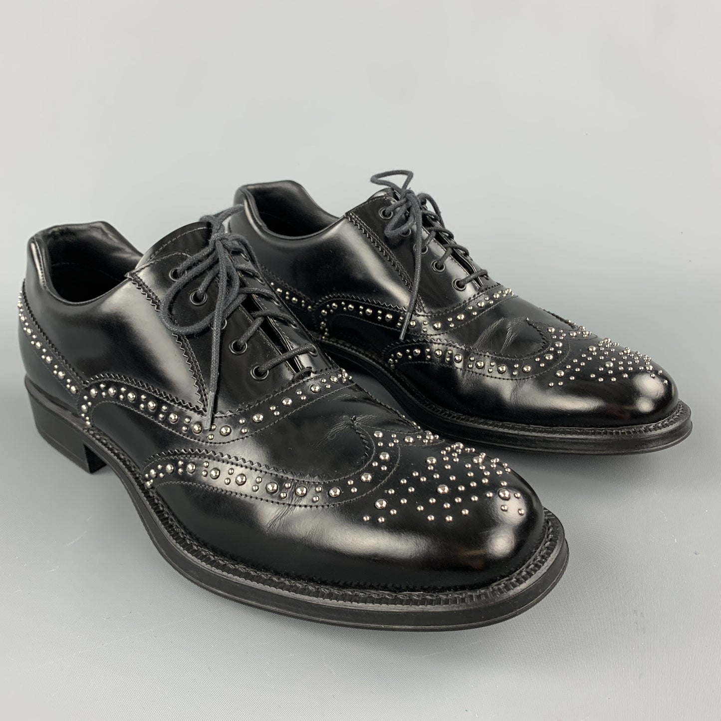 PRADA Size 9.5 Black Studded Leather Wingtip Lace Up Oxfords
