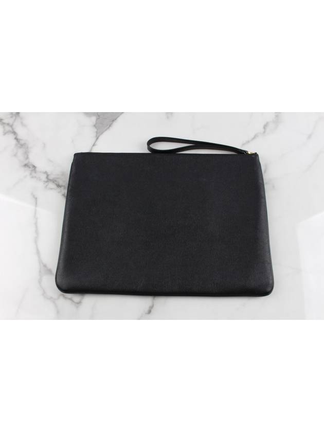 Balenciaga logo strap clutch