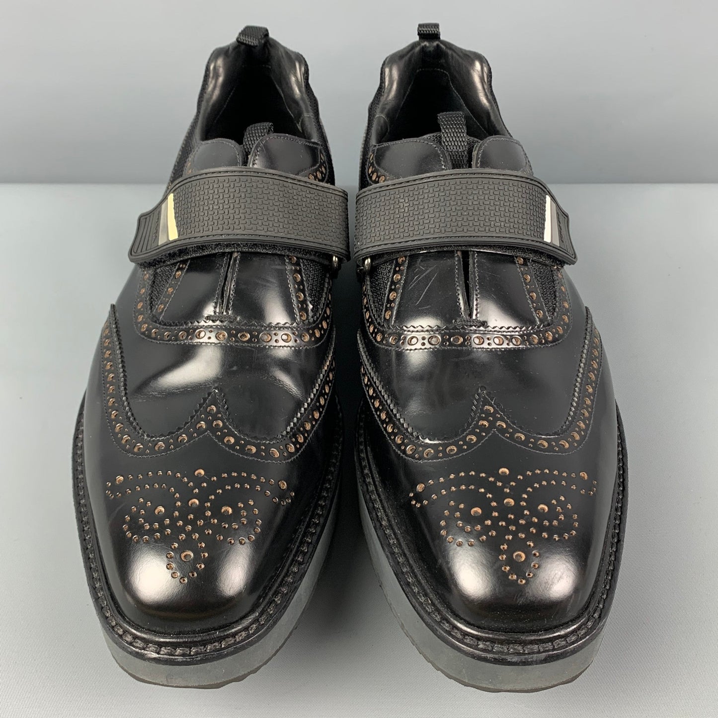 PRADA Size 11 Black Perforated Leather Wingtip Loafers