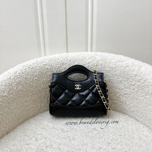 Chanel 31 Micro Shopping Bag in Black Shiny Calfskin and LGHW