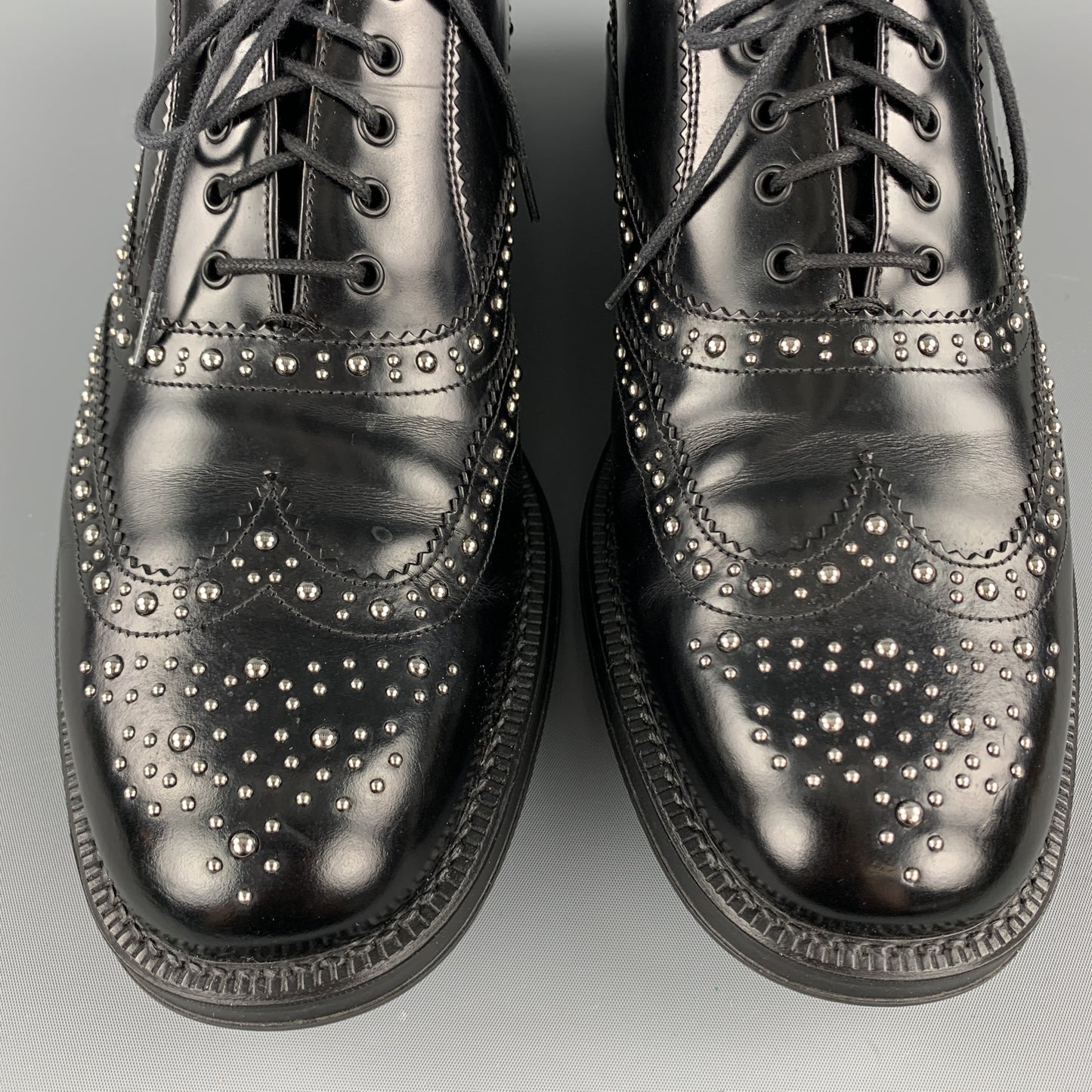 PRADA Size 9.5 Black Studded Leather Wingtip Lace Up Oxfords