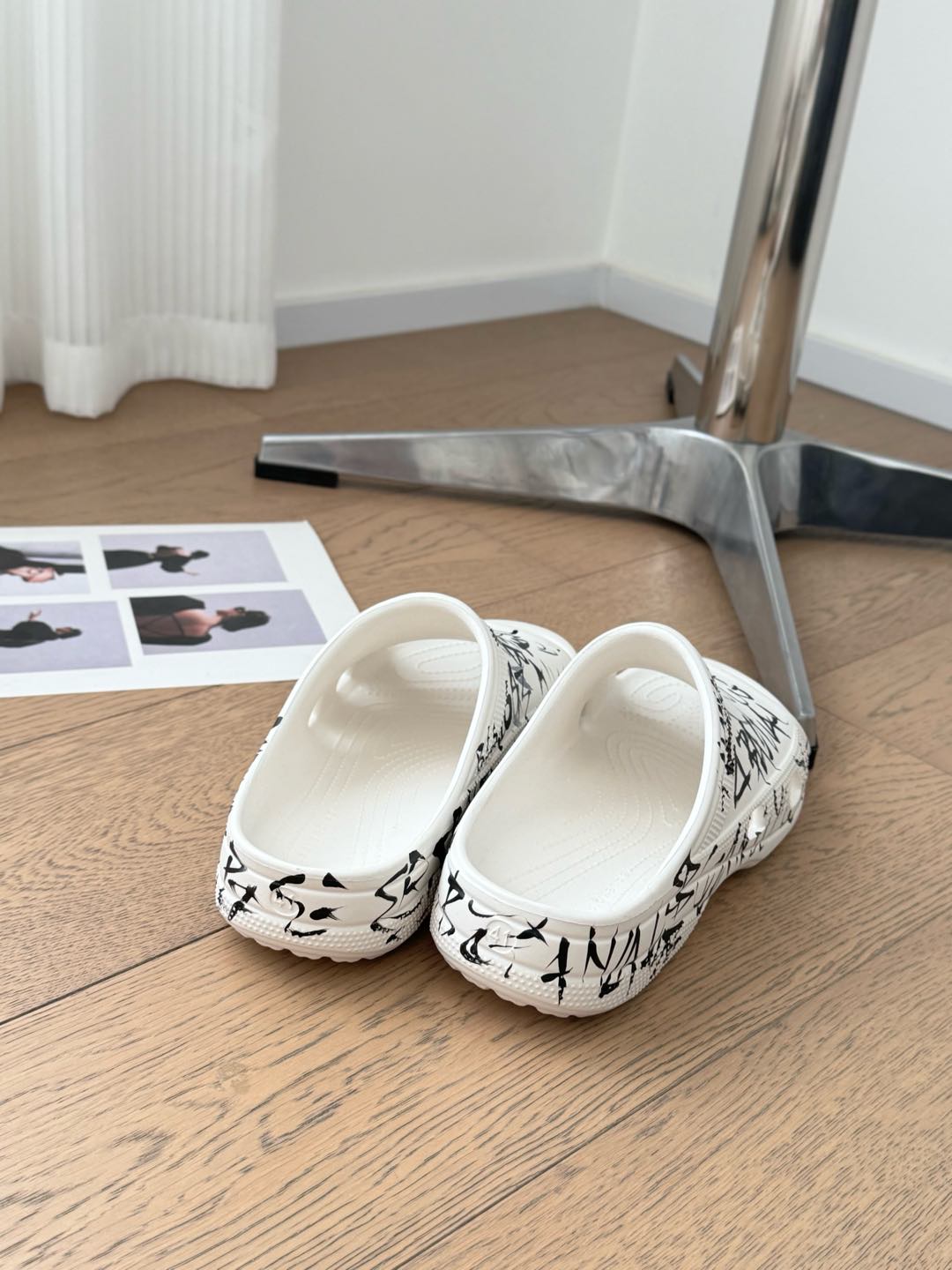 Balanciaga POOL GRAFFITI CROCS SLIDE SANDALS IN WHITE AND BLACK RUBBER