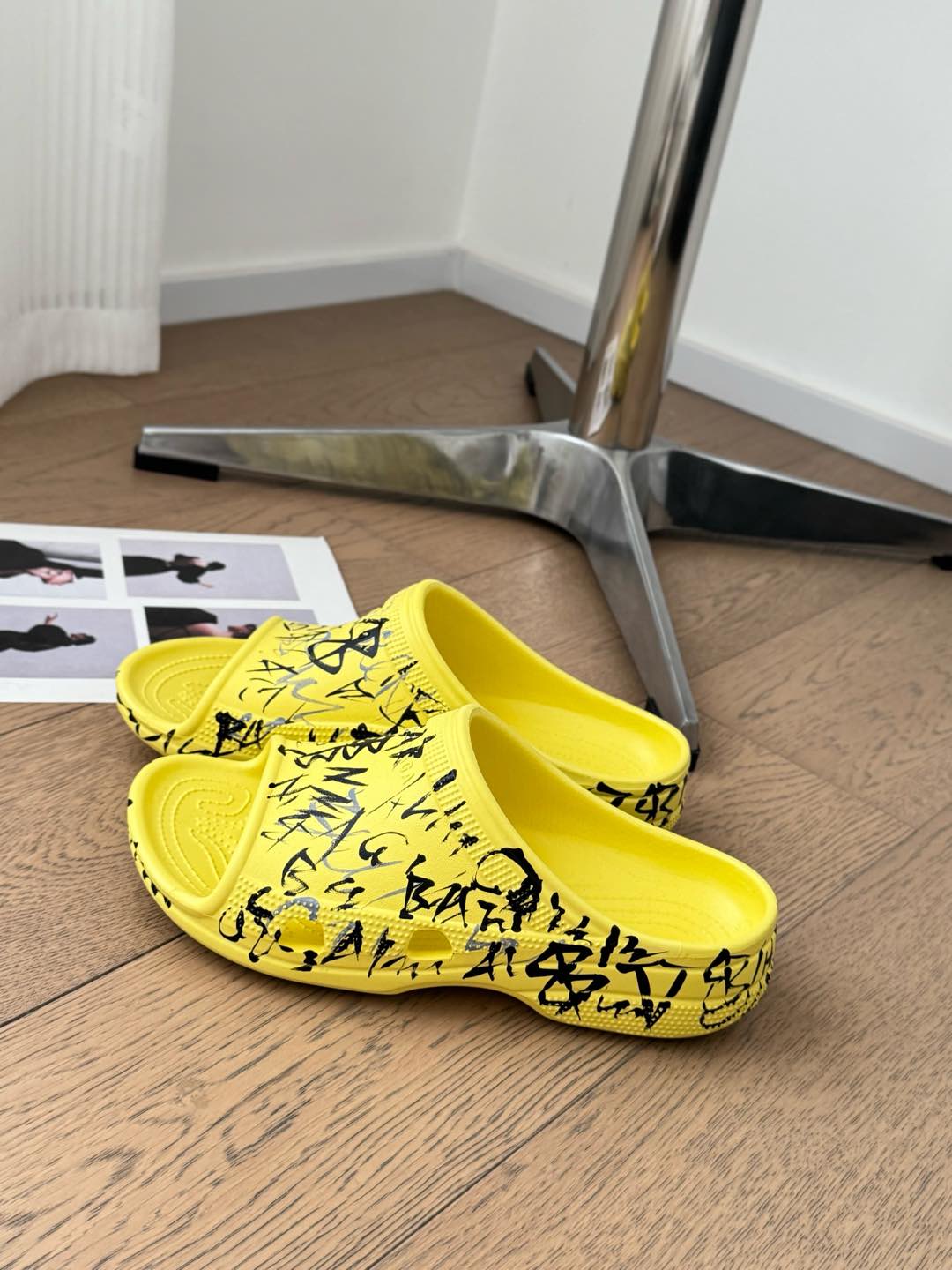 Balanciaga POOL GRAFFITI CROCS SLIDE SANDALS IN YELLOW AND BLACK RUBBER