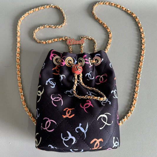 CHANEL BACKPACK 22CM BLACK & MANY OTHER COLORS PRINTED FABRIC GOLD HARDWARE