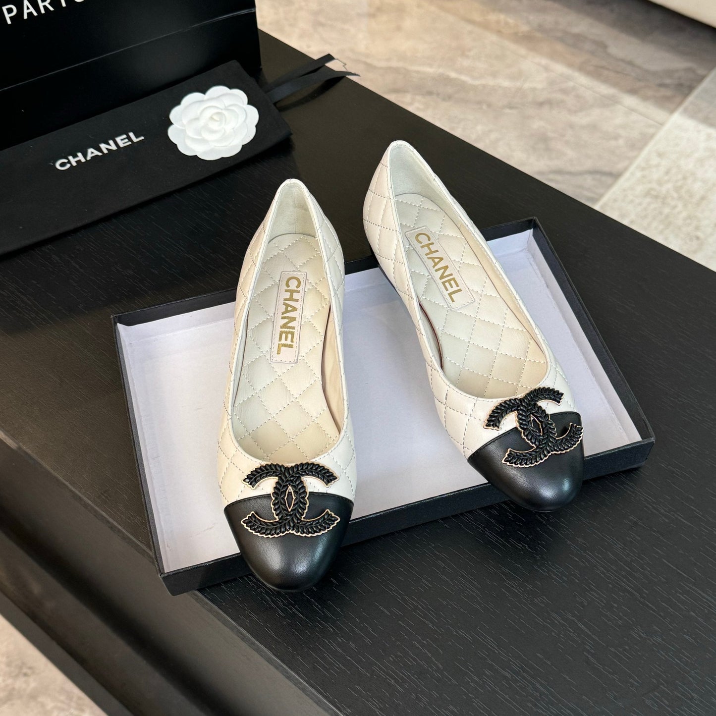 CHANEL ballet flat white quilted lambskin large black logo
