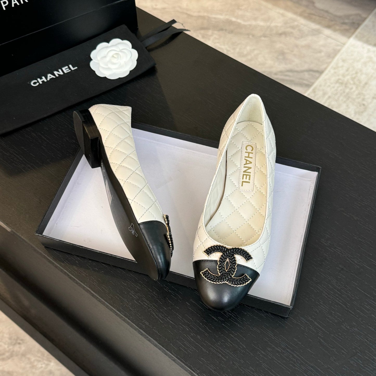 CHANEL ballet flat white quilted lambskin large black logo