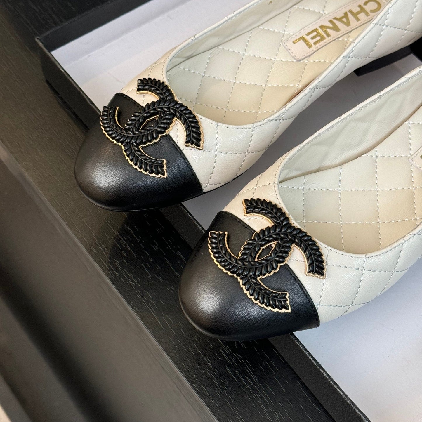 CHANEL ballet flat white quilted lambskin large black logo
