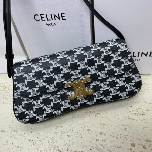 Celine LOLA BAGUETTE BAG 28 IN BLACK MIX WHITE MONOGRAM CANVAS AND CALFSKIN