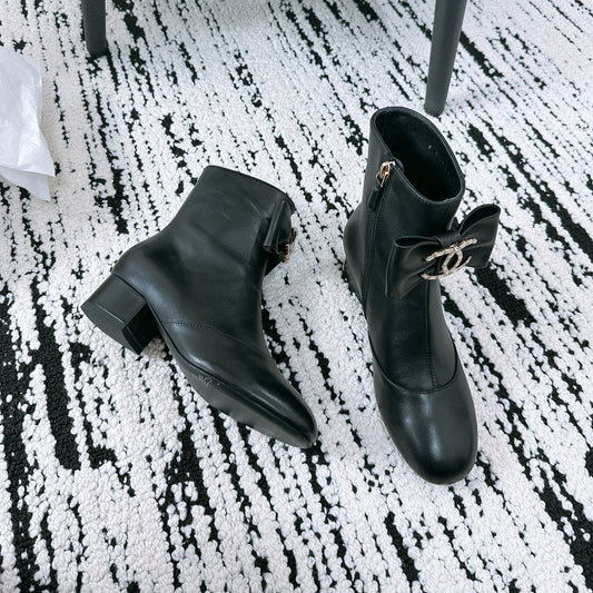 CHANEL Ankle Boots In Black Cowhide With Bow Tie 144661