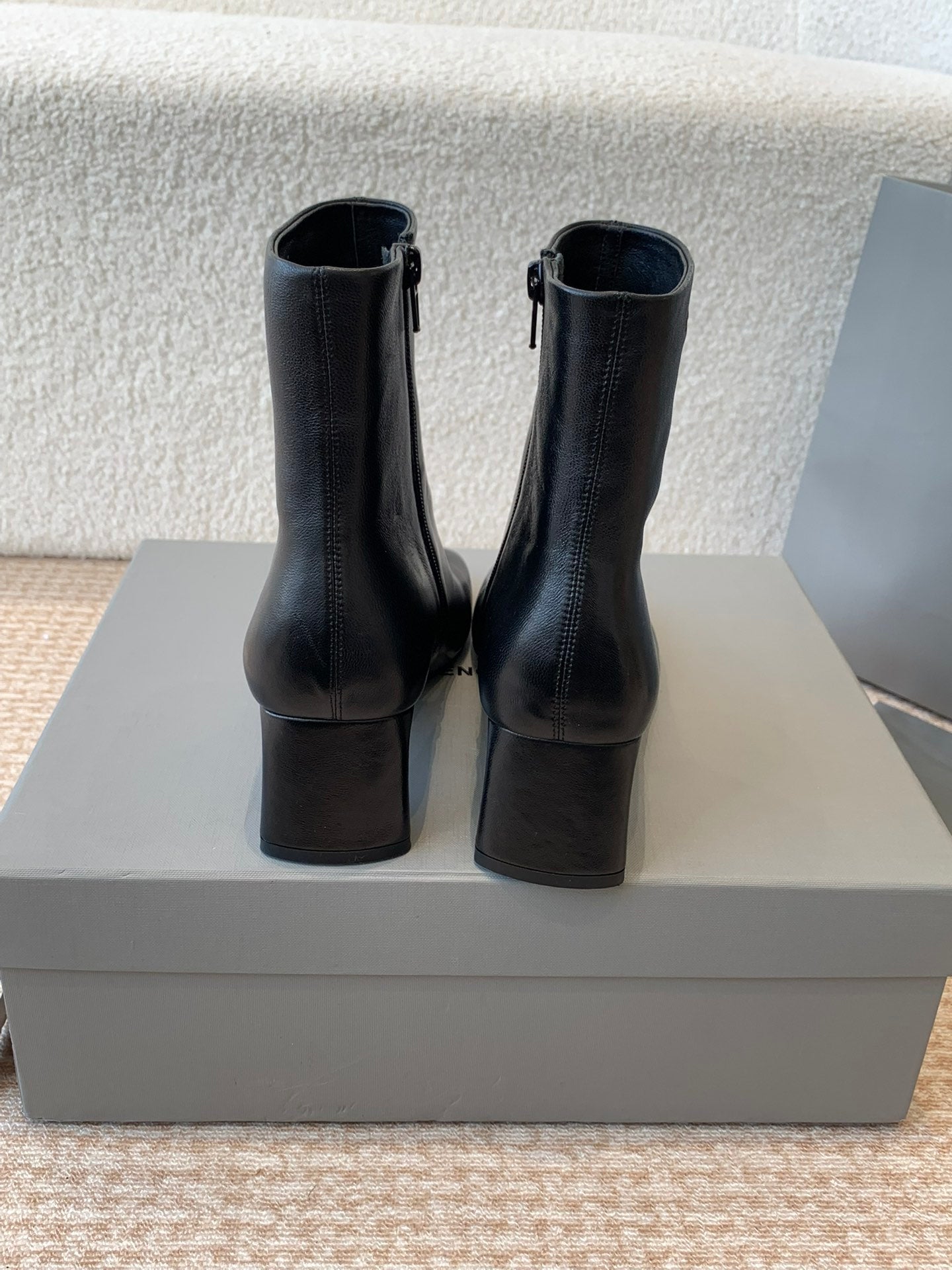 Balanciaga ANKLE BOOTS IN BLACK LOGO EMBOSSED SOFT SHEEPSKIN