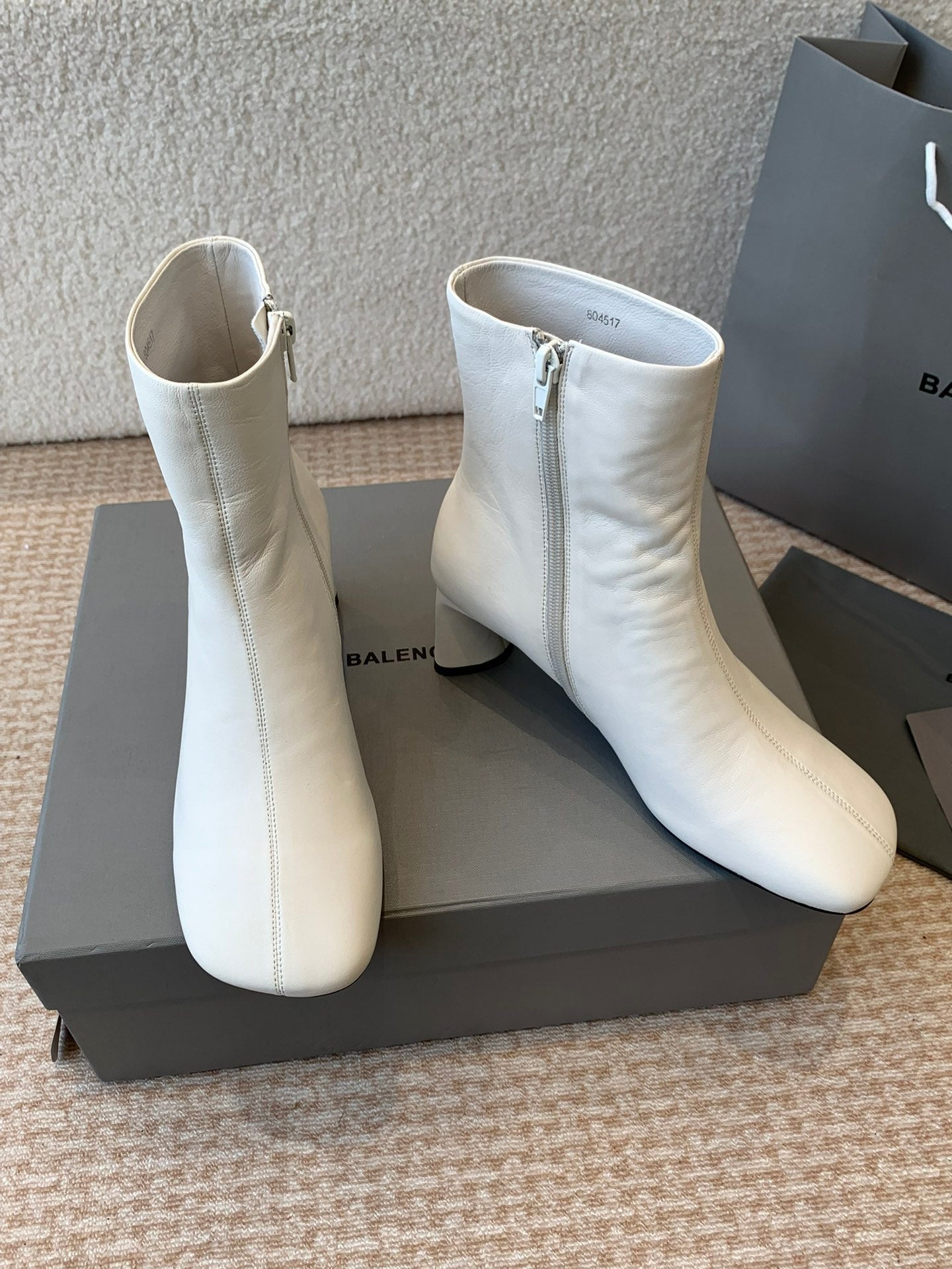 Balanciaga ANKLE BOOTS IN WHITE LOGO EMBOSSED SOFT SHEEPSKIN