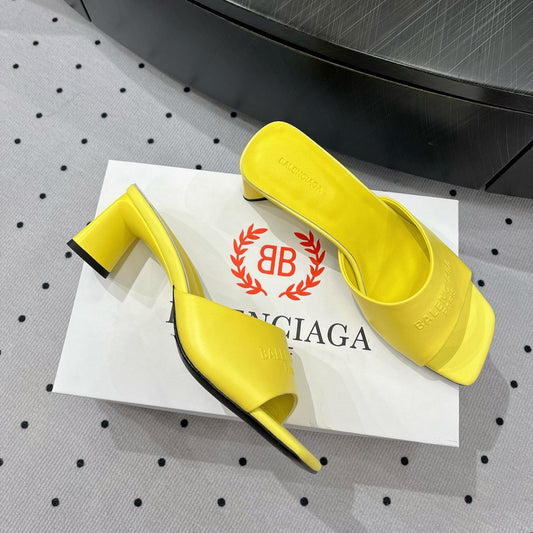 Balanciaga SQUARE-TOE MEDIUM HEEL MULES IN YELLOW CALFSKIN LOGO EMBOSSED