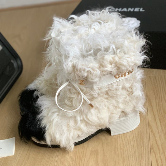 CHANEL ANKLE BOOTS IN WHITE MIX BLACK WOOL FUR