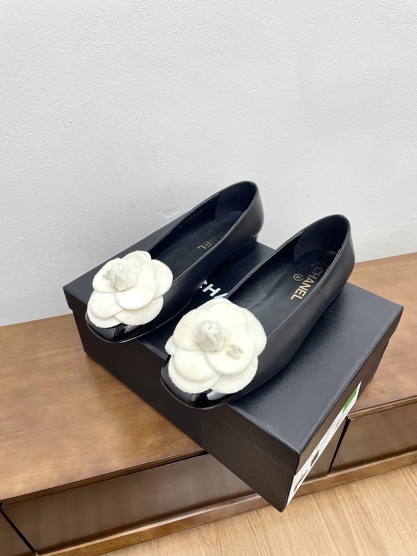 CHANEL Ballet Flats Black With Camellia White Lambskin