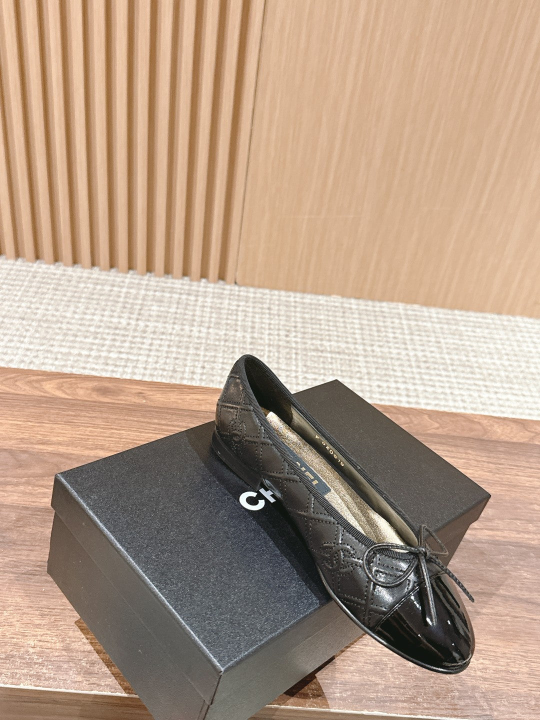 CHANEL ballet flat black quilted lambskin patent calfkin toe