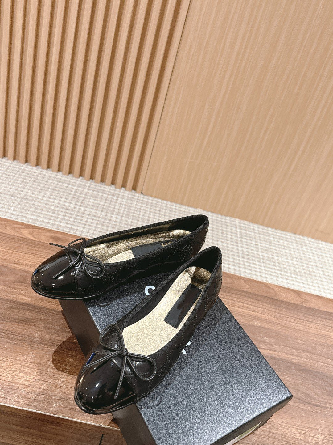 CHANEL ballet flat black quilted lambskin patent calfkin toe