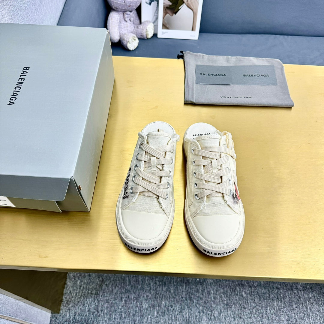 Balanciaga SNEAKER MULES IN WHITE CANVAS GRAFFITI LOGO