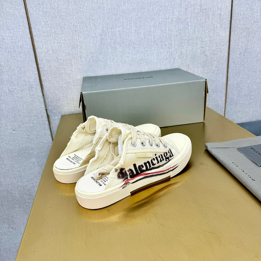 Balanciaga SNEAKER MULES IN WHITE CANVAS GRAFFITI LOGO