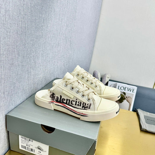 Balanciaga SNEAKER MULES IN WHITE CANVAS GRAFFITI LOGO