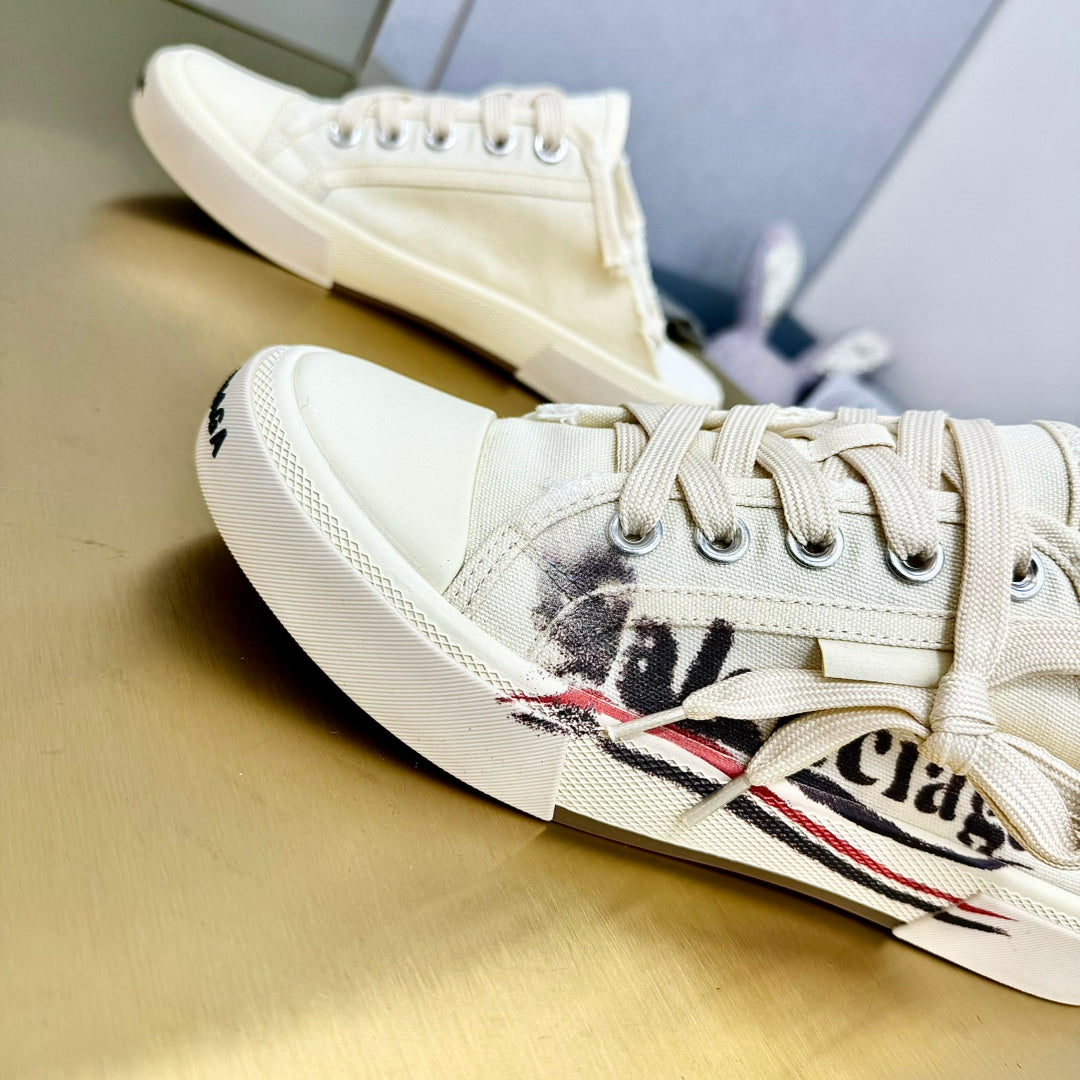 Balanciaga SNEAKER MULES IN WHITE CANVAS GRAFFITI LOGO