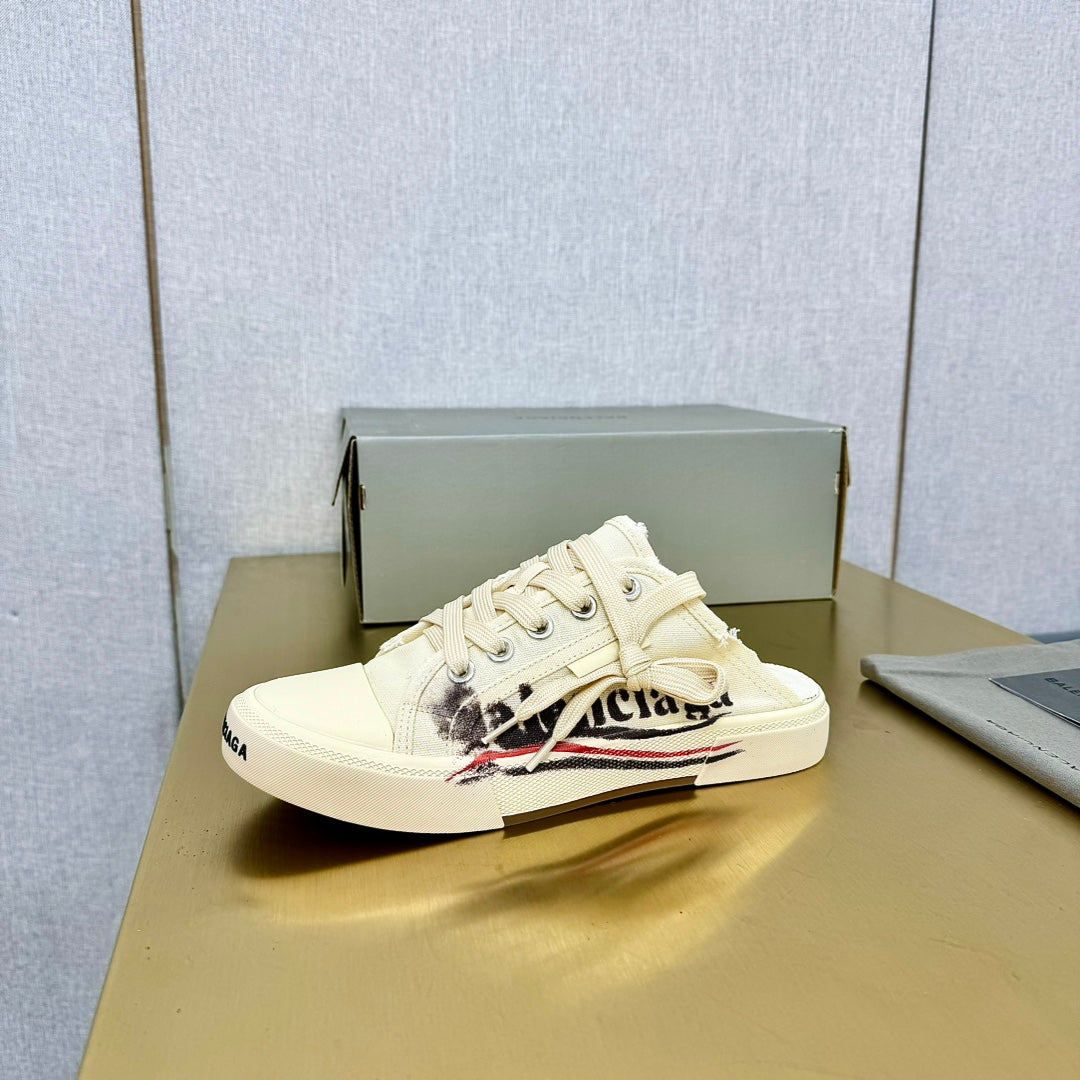Balanciaga SNEAKER MULES IN WHITE CANVAS GRAFFITI LOGO
